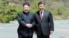 North Korean leader Kim Jong Un shakes hands with China's President Xi Jinping, in Dalian, China in this undated photo released on May 9, 2018 by North Korea's Korean Central News Agency (KCNA).