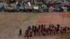 Migrantes en proceso de evaluación por las autoridades de EE. UU. en el sector Del Río, Texas, el 21 de septiembre de 2021.