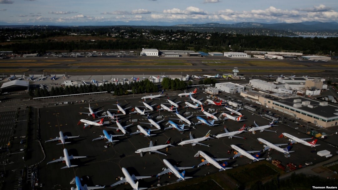 FILE PHOTO: Boeing 737 Max aircraft are parked in a parking lot at Boeing Field in this aerial photo taken over Seattle