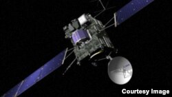 FILE - Artist view of the Rosetta spacecraft. Rosetta’s lander, Philae, is attached and is shown in blue (© ESA/J. Huart)