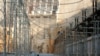 FILE - A man walks within the Gibe III hydroelectric dam during its inauguration in Shoma Yero village in Southern Nations, Nationalities, and Peoples' Region in Ethiopia, Dec. 17, 2016. 