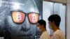 An advertisement for Bitcoin and cryptocurrencies is seen in Hong Kong, Sept. 27, 2021. 