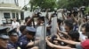 Protesters clash with riot police and U.S. Embassy guards as the former rush towards the embassy gates to protest the joint U.S.-Philippines military exercises dubbed "Balikatan 2011," which opened in Manila, Philippines, April 5, 2011.