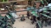 In a still image taken from not independently confirmed video, Chinese riot police are seen pushing against protesters in the coastal village of Wukan, in Guangdong province, China.
