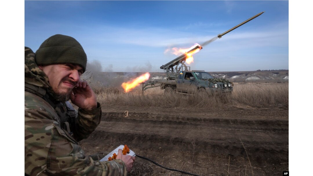 A Ukrainian officer from the 56th Separate Motorized Infantry Mariupol Brigade fires a multiple launch rocket system based on a pickup truck toward Russian positions at the front line, near Bakhmut, Donetsk region, Ukraine, on March 5, 2024.