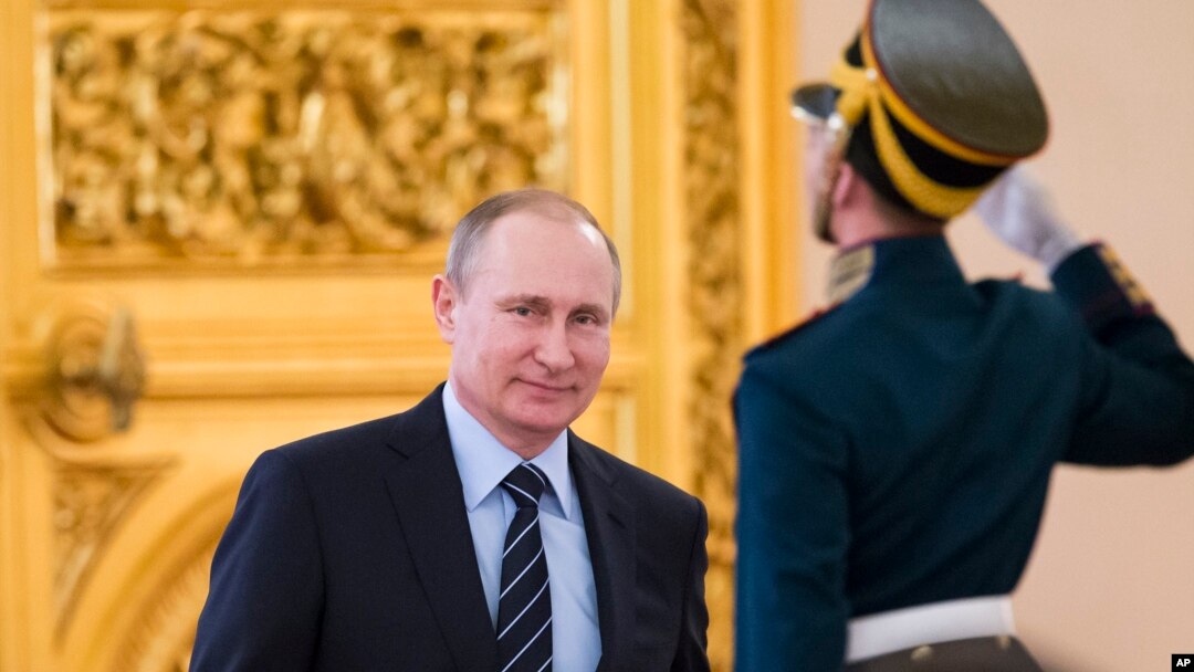 Russian President Vladimir Putin arrives to cheir a meeting of a committee on preparations for upcoming Victory Day in WWII, in Moscow's Kremlin, Russia, on April 5, 2016. 
