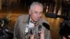 FILE - Donald Gregg, a former U.S. ambassador to South Korea, shown speaking to reporters in Beijing after a visit to North Korea in February 2014, says U.S.-South Korea relations “are in no danger at all" because of an attack on Ambassador Mark Lippert.