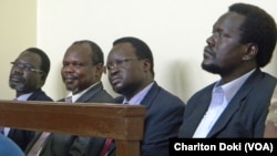 Former SPLM secretary-general Pagan Amum (second from left) testified in his own defense in a court in Juba on Friday, April 11.