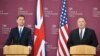 U.S. Secretary of State Mike Pompeo, right, and Britain's Foreign Secretary Jeremy Hunt speak at a joint press conference at the Foreign Office in London, May 8, 2019.