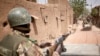 Troops of the Malian army patrol the ancient town of Djenne in central Mali, Feb. 28, 2020. 