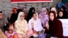 FILE - Pakistani lawyer Jalila Haider, center, from the Hazara Shi'ite minority community participates in a hunger strike with others at a camp in Quetta, Apr. 30, 2018. 