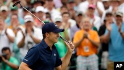 Jordan Spieth celebrates after winning the Masters golf tournament, April 12, 2015, in Augusta, Georgia.