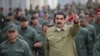 Venezuela's President Nicolas Maduro gestures during a meeting with soldiers at a military base in Caracas, Venezuela, Jan. 30, 2019. 