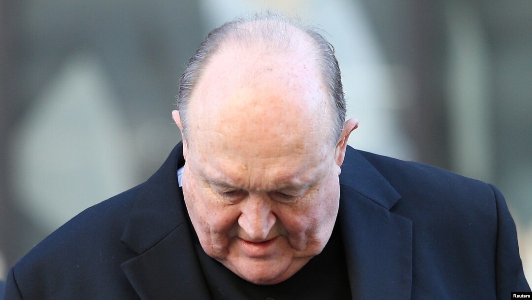 FILE - Archbishop Philip Wilson arrives at Newcastle Local Court in Newcastle, Australia, May 22, 2018.