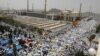 Muslim pilgrims pray outside Namira Mosque on the plains of Arafat during the annual haj pilgrimage, outside the holy city of Mecca, Saudi Arabia, Aug. 31, 2017.