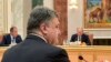 Ukraine's President Petro Poroshenko (front), Russia's President Vladimir Putin (R) and Foreign Minister Sergei Lavrov attend a meeting with high-ranked officials representing Russia, Belarus, Kazakhstan, Ukraine and the European Union in Minsk, Aug.26, 2