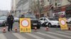FILE - Police vehicles block a street of the prefectural seat of Shuangyashan after several days of protest by miners over late wages in northeastern China's Heilongjiang province. Frustration among miners over unpaid wages has swelled to the brink of unrest in the province in China’s far northeast. (AP Photo/Gerry Shih) Police vehicles block a street of the prefectural seat of Shuangyashan after several days of protest by miners over late wages in northeastern China's Heilongjiang province. Frustration among miners over unpaid wages has swelled to the brink of unrest in the province in China’s far northeast.