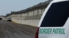 FILE - U.S. Border Patrol vehicles are patrol along the U.S. Mexico border area in San Diego, California, April 21, 2017. 