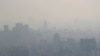Air pollution blankets the skyline in Tehran, Iran, Nov. 30, 2019. 