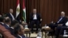 Head of the Hamas political bureau, Ismail Haniyeh, center, and Hamas leader in the Gaza Strip Yahya Sinwar, right, meet with Egypt's general intelligence chief, Khaled Fawzy, and others in Haniyeh's office in Gaza City, ahead of talks in Cairo, Oct. 3, 2017.