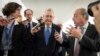 Senate Majority Leader Mitch McConnell, R-Ky., is surrounded by reporters as Republicans work to pass their tax bill, on Capitol Hill in Washington, Nov. 30, 2017.