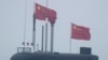 In this April 23, 2019, file photo, a new type 094A Jin-class nuclear submarine Long March 10 of the Chinese People's Liberation Army (PLA) Navy participates in a naval parade to commemorate the 70th anniversary of the founding of China's PLA Navy.